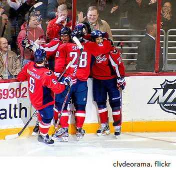 Hockey team celebrating with same uniforms