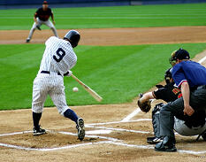 Yankees batter wearing pinstriped uniform