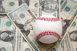Baseball on a bed of money