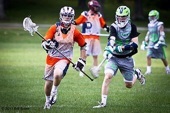 Highschool lacrosse players in sublimated jerseys