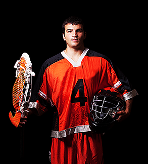 Lacrosse player in orange uniform