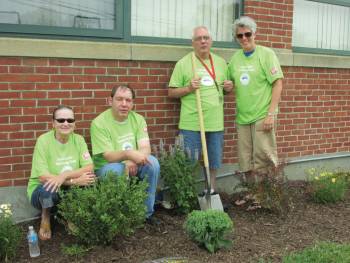 The Trudeau Center staff at work maintaining the SquadLocker grounds!