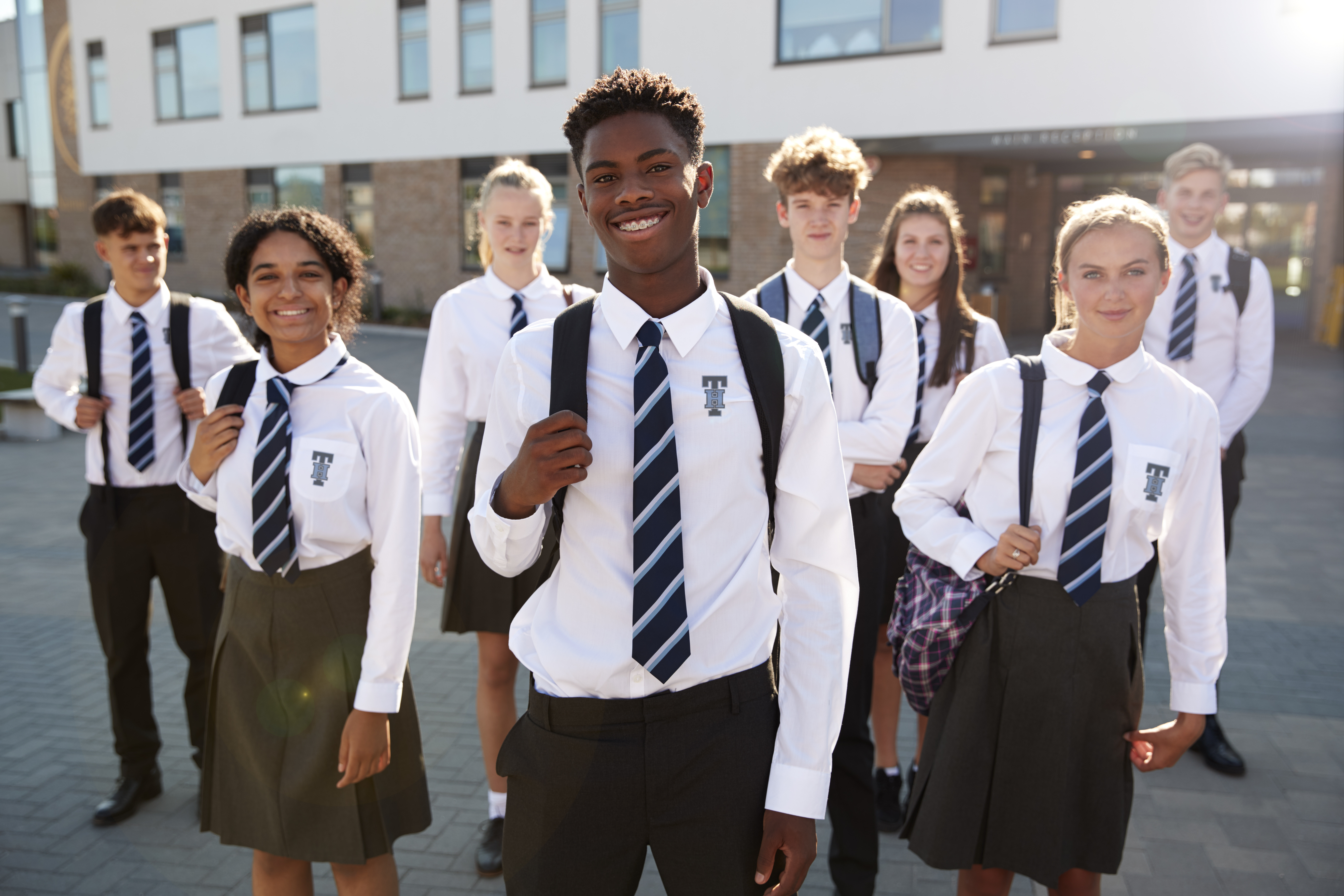 Group Of Students in School Uniforms - Tips for Picking A School Uniform Provider