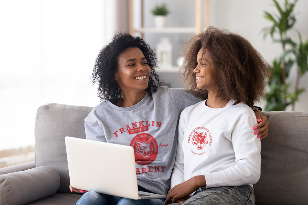 Mother and Daughter wearing spirit wear tee shirts