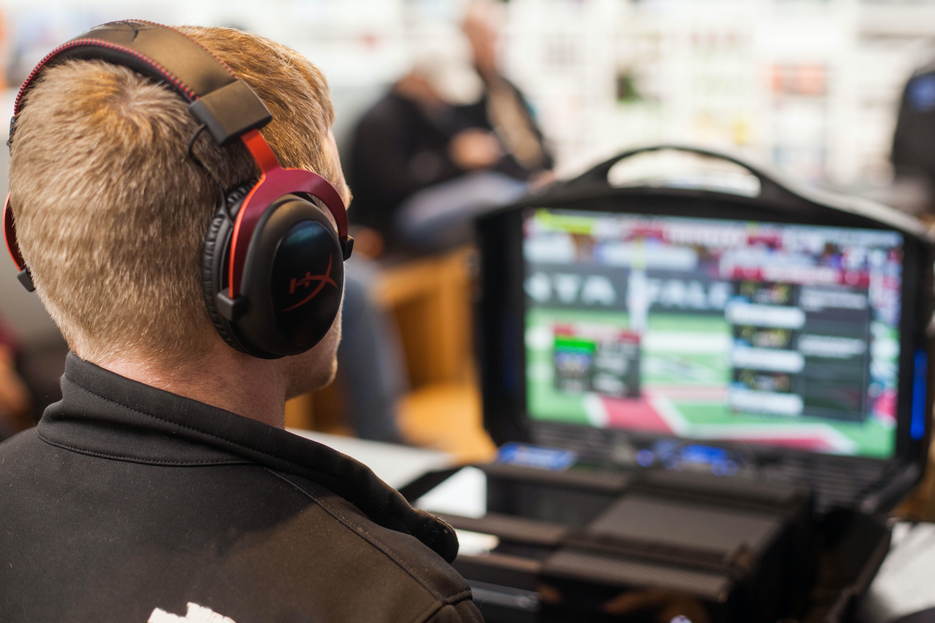 A Career Path Through Esports? | Young man playing professional esports with headset on